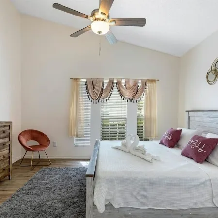 Lovely home near Disney with a Heated pool and game room in a resort community.