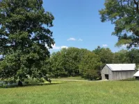 Greenwood Farm log cabin close to the Bourbon Trail and Keeneland Hotels in Woodford County