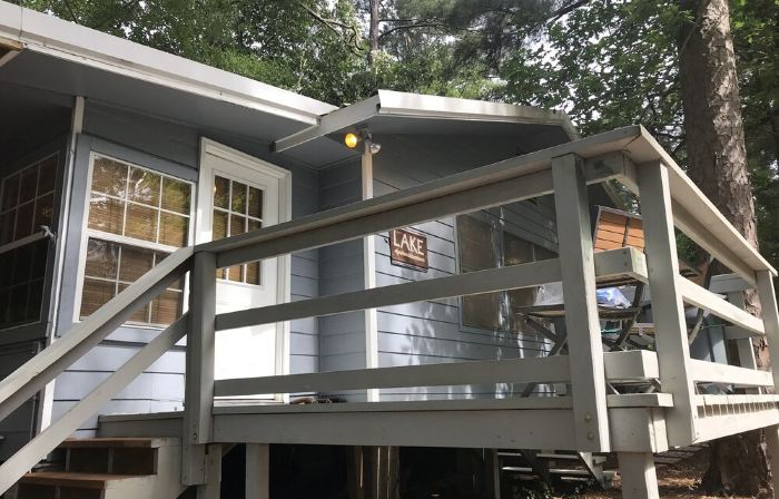 Charming Cottage Snuggled in Main Lake Cove with Perfect Location and Views