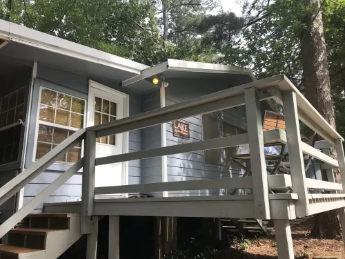 Charming Cottage Snuggled in Main Lake Cove with Perfect Location and Views