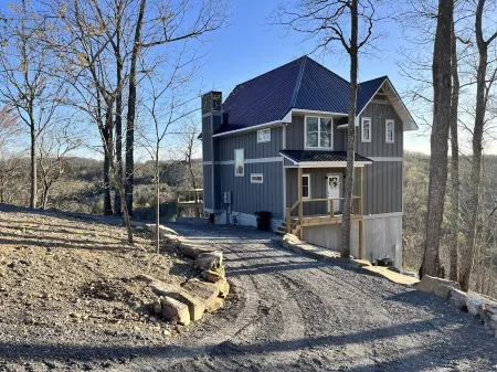 Stunning views of Center Hill Lake and mountains from this NEW build dream house