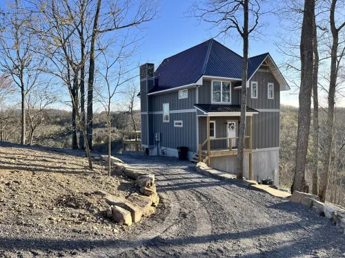 Stunning views of Center Hill Lake and mountains from this NEW build dream house