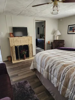Welcome to our charming farmhouse retreat nestled in the Kentucky countryside.