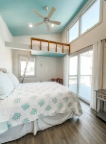 Modern Beachfront Cottage with Endless Bay Views