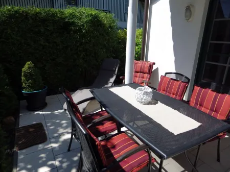 ground floor apartment with south-west terrace, central, near the beach Отели в г. Цингст