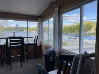 The Inn at Highland Lake, 2nd Floor, waterfront yard with a boat dock