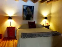 Cozy Casa Carmelita features a Brilliant Kiva Fireplace, Unique Patio & Hot Tub!