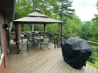 Cozy chalet with hot tub and ski resort view