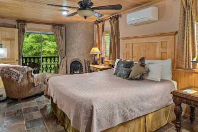 Creekside Chateau,patio overlooks Oak Creek, with steps directly to the water