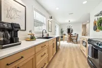 Backyard Fire Pit, Game Area and Cozy Seating - Charming Oasis Hotels in Fayetteville