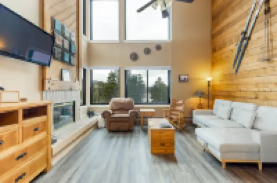 Mountain and River Views with Cozy Living Area - Charming Alpine Retreat