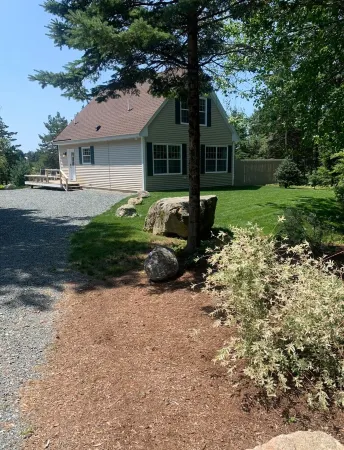 Sunlit cape on beautiful Bass Harbor close to Acadia National Park