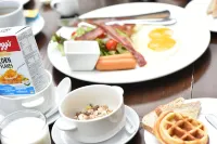 Zantiis Ndol Villas - servizio colazione