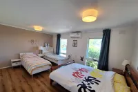 Auyea Farm 3 BR Entire  House  with Table Tennis - 7 Minutes to Gumbuya World!