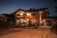 Fantastic apartment in a log cabin in front of the mountains