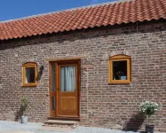 Barn conversion on small working farm