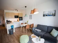 Modern, bright apartment with terrace, directly behind the dike, in the North Sea resort Wremen Hotels in Wremen