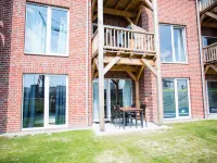 Modern, bright apartment with terrace, directly behind the dike, in the North Sea resort Wremen Hotels in Wremen