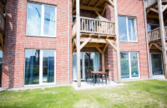 Modern, bright apartment with terrace, directly behind the dike, in the North Sea resort Wremen