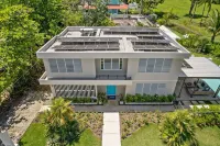 Your own beach house, private pool & pickle ball court, steps to beach.