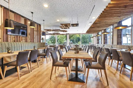 Landgasthof Moser & Restaurant Bootshaus Отели в г. Кюнцинг