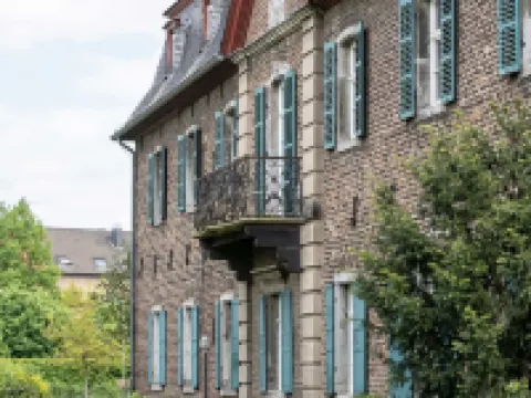 Boardinghouse Burgpark Hoteles en Hurth-Hermulheim