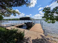 Charming Cabin with Deck and Fireplace - Serene Woodland Escape Hotels in Plum Lake