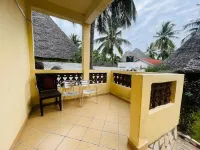 Two minutes walk  to the Beach! a comfortable 4Bedroom Villa in Diani Galu Beach