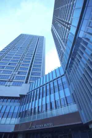 The Comfortable Trini Hotel Отели рядом с достопримечательностью «Everland»