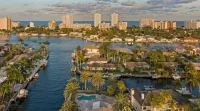 "Luxury waterfront mansion with large pool" Near clear water & sandy beaches !