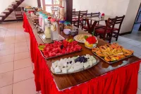 Rede Andrade Estrela Dalva Centro Hotel - servizio colazione