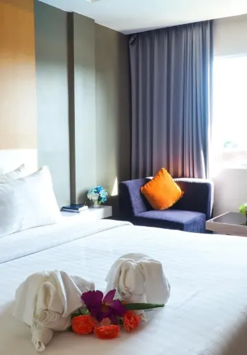 ห้องดีลักซ์ เตียงใหญ่ 1 เตียง