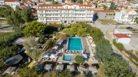 Hotel Summery Отели рядом с достопримечательностью «Petani Beach»