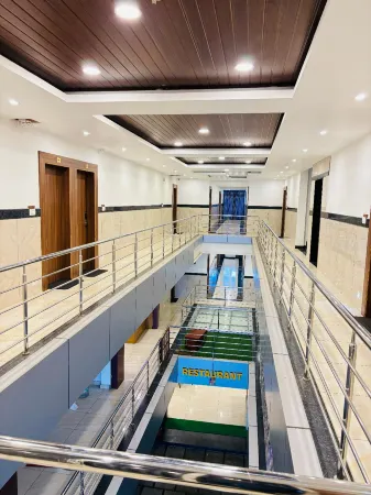 Hotel Starfinch Inn Отели рядом с достопримечательностью «Намдролинг Монастери»