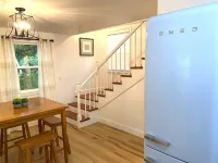 Experience History in an original Carriage House located behind a Colonial home.