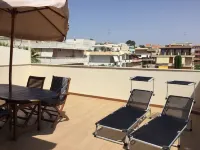 Attic, stylishly furnished, large terrace and sea view, 5 min. to the beach. Hotels in Pozzallo