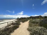 Absolute Beachfront on the cliff with easy stair access to the beach (BYO LINEN)