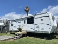Brand New 2025 RV on a Private Canal Lot and Close to Beach