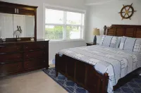 Dog-Friendly Waterfront House with 37ft Dock and Cabana Beach Club & Pool