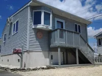 Gorgeous Beach Home. 1 Block to Ocean & Bay… Labor Day Weekend Available!