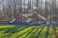 Spacious 6-bedroom Pocono Home with Hot Tub, Game and Theater rooms, Fire Pit!