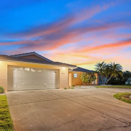 Water Front Home with Heated Pool & Hot Tub, 2 Master Suites & a Floating Dock.