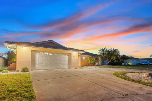 Water Front Home with Heated Pool & Hot Tub, 2 Master Suites & a Floating Dock.