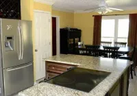 Secluded Private  4-bedroom house with WiFi, AC pool/hot tub/bar Gulfport