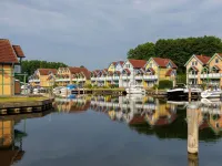 Cozy Holiday Home with Wood Burning Stove Near Water