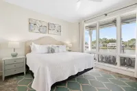 Bayfront Home with Ample Outdoor Seating - Charming Coastal Retreat