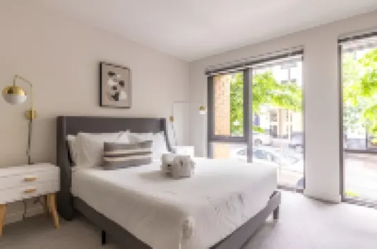 Sleek Kitchen and Ample Space - Chic Downtown Getaway