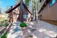 Forest-view cabin with woodstove & furnished deck - walk to golf course