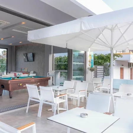 Agrelli Hotel & Suites Отели рядом с достопримечательностью «Пляж Кардамена»