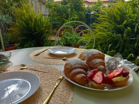 Bed and Breakfast Rosangela Отели рядом с достопримечательностью «Публичный сад»